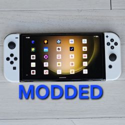 NINTENDO SWITCH OLED MOD + 300 TOP GAMES + 25000 RETROS + MOVIES