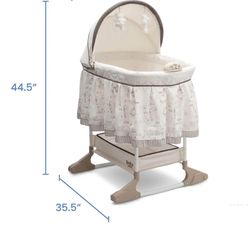 Delta Children Bassinet with Snuggle Me Newborn Pillow