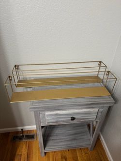2 gold hanging shelves