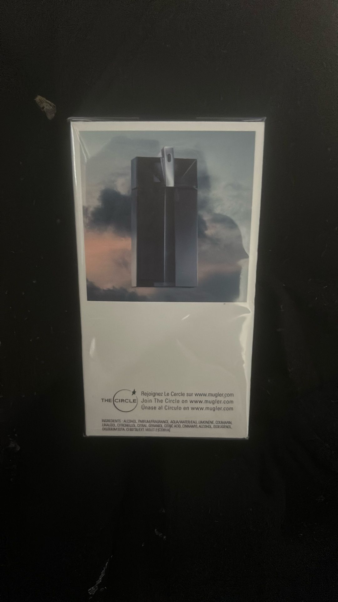 The image shows a box for Mugler Alien Man Eau de Toilette. This is a men's fragrance by the French fashion and perfume house Mugler.