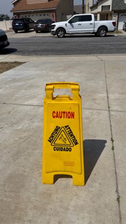 Yellow caution sign