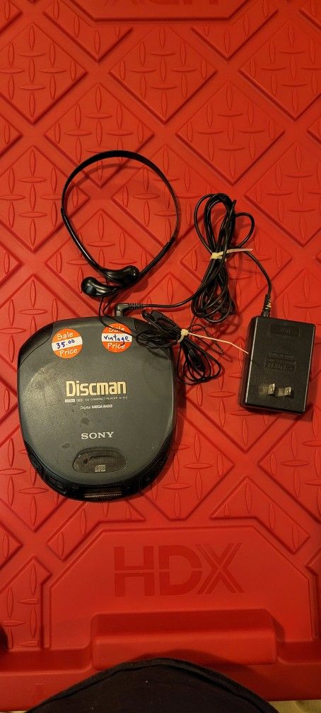 Sony Discman D-153 Digital MegaBass Compact CD Player with headphones and power supply - Vintage