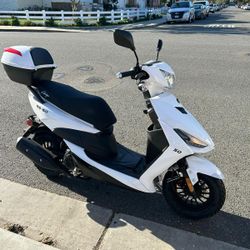 BRAND NEW MOPED 