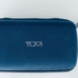 Tumi NEW  blue hard shell toiletry bag.