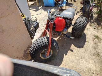 Big red Honda 125cc 3wheeler
