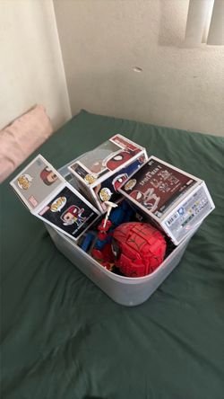 Box of legos and funko pop