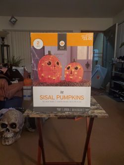 2 Lit Pumpkins