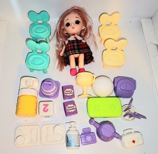 4 inch doll and lot of plastic accessories