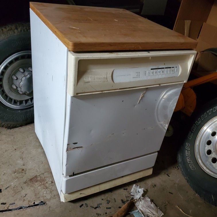 Old Skool Portable Dishwasher...  Works Great . Plugs Into 110 And Water Supply Hose Hooks To Your Kitchen Sink Focet