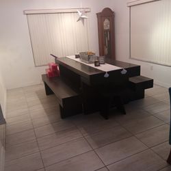 All Wood Heavy Construction Dinning Room Table, in excellent Conditions, with two Side Benches as a set.