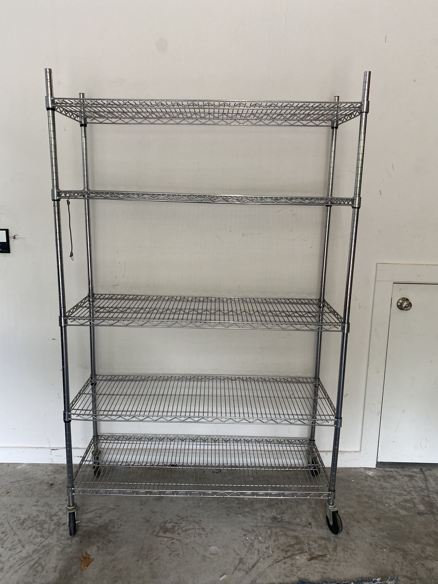 Heavy duty adjustable metal rolling shelving rack