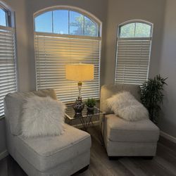 Two Chairs And Silver Table 