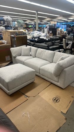 Light Gray Sectional Sofa with Ottoman