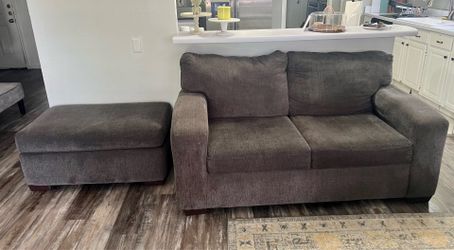 GRAY LOVE SEAT AND FOOT CUSHION