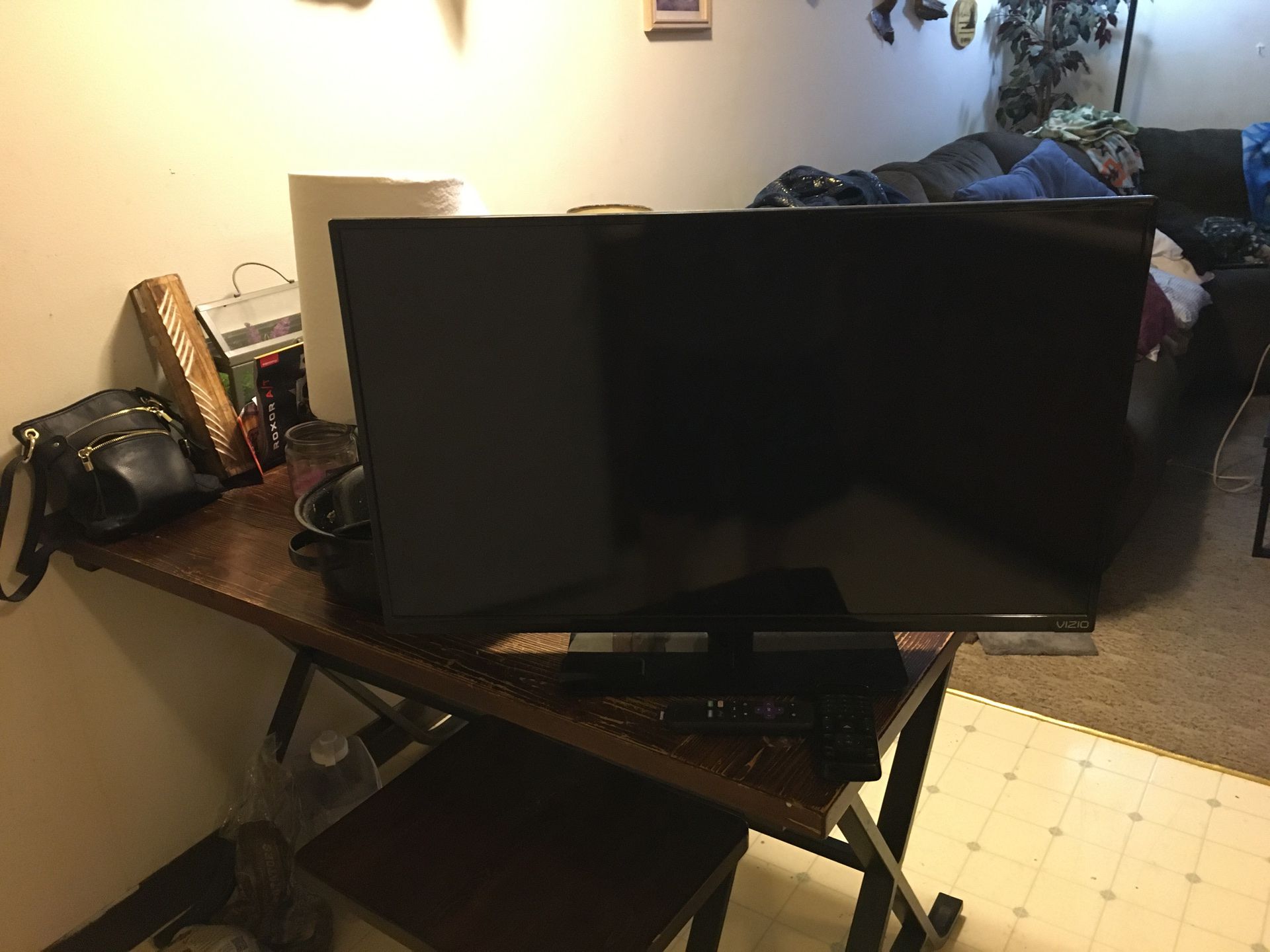 32” flat screen tv with Roku it’s like brand new and works perfect...perfect for a bedroom as that’s what we were using it but now we are moving and
