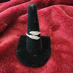 Sterling silver twin feather adjustable ring.  Multiples are available 