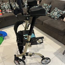 Up right Walker Rollator / chair new asking $125 paid 380 for it never used 