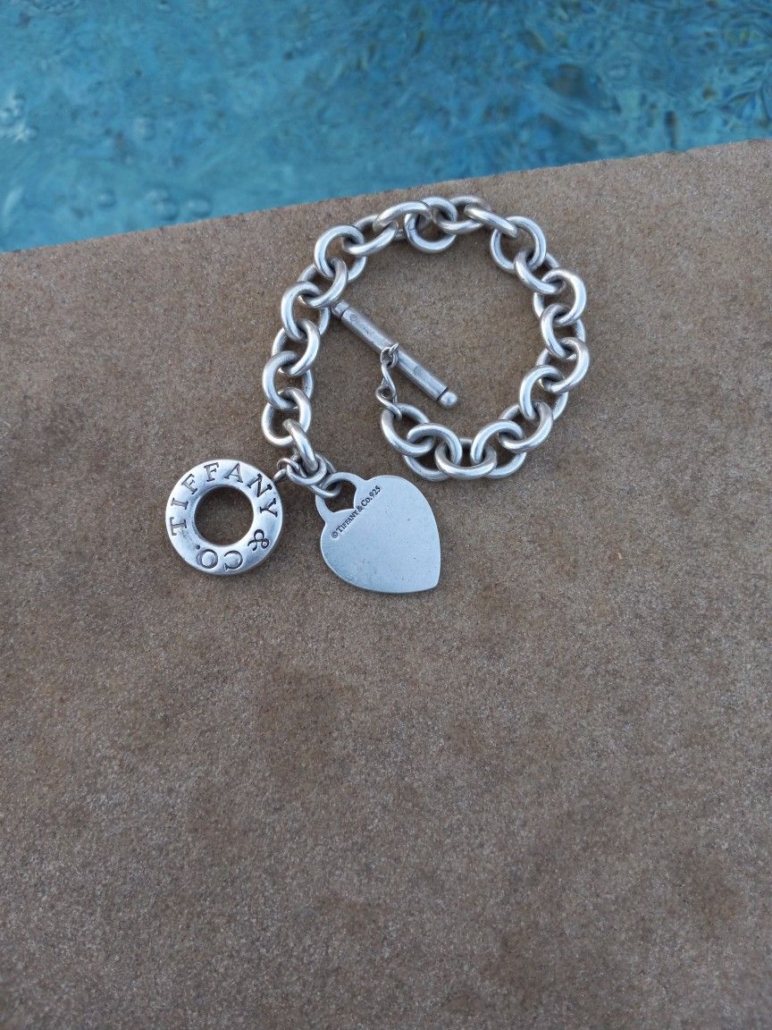 TIFFANY AND CO TOGGLE BRACELET WITH HEART CHARM