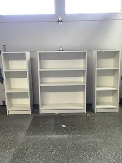 Three White IKEA Bookshelves