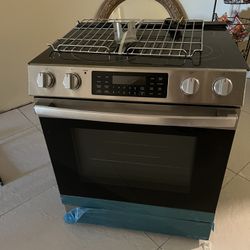 30 Inch Electric Stove Has Deep Scratch And Small Crack On Back End None Of Which Affect Stove We Used For 2 Months 