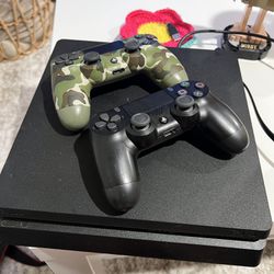 PS4 W/ Controllers & Games