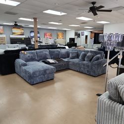 Grey SLEEPER CURDOROY SECTIONAL WITH STORAGE. AVAIL IN 5 COLORS 