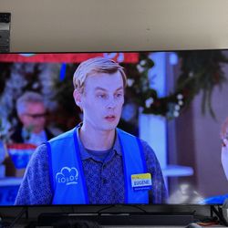 85” Samsung smart Tv And LG Soundbar with Entertainment Center
