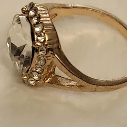 Ring With WITH  CLEAR GEMSTONE