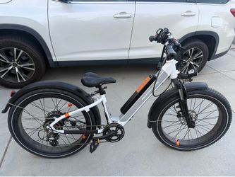 Selling White Rad Power Bikes RadRover 6 Plus Step-Thru e-bike.
