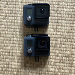 2 GoPro Heroes