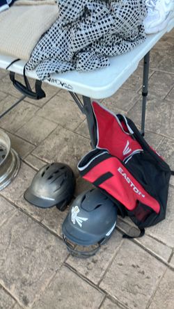 Softball/baseball helmets and bag.