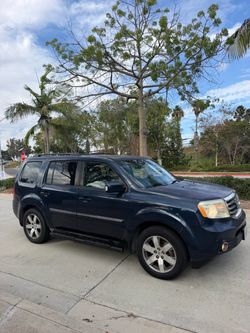 2012 Honda Pilot Touring with about 175k miles