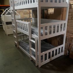 Triple bunk bed. Available in white & espresso. Assembly required. Assembly not included. Taxes included. Free delivery.  Bunk bed only-$450 Bunk bed 