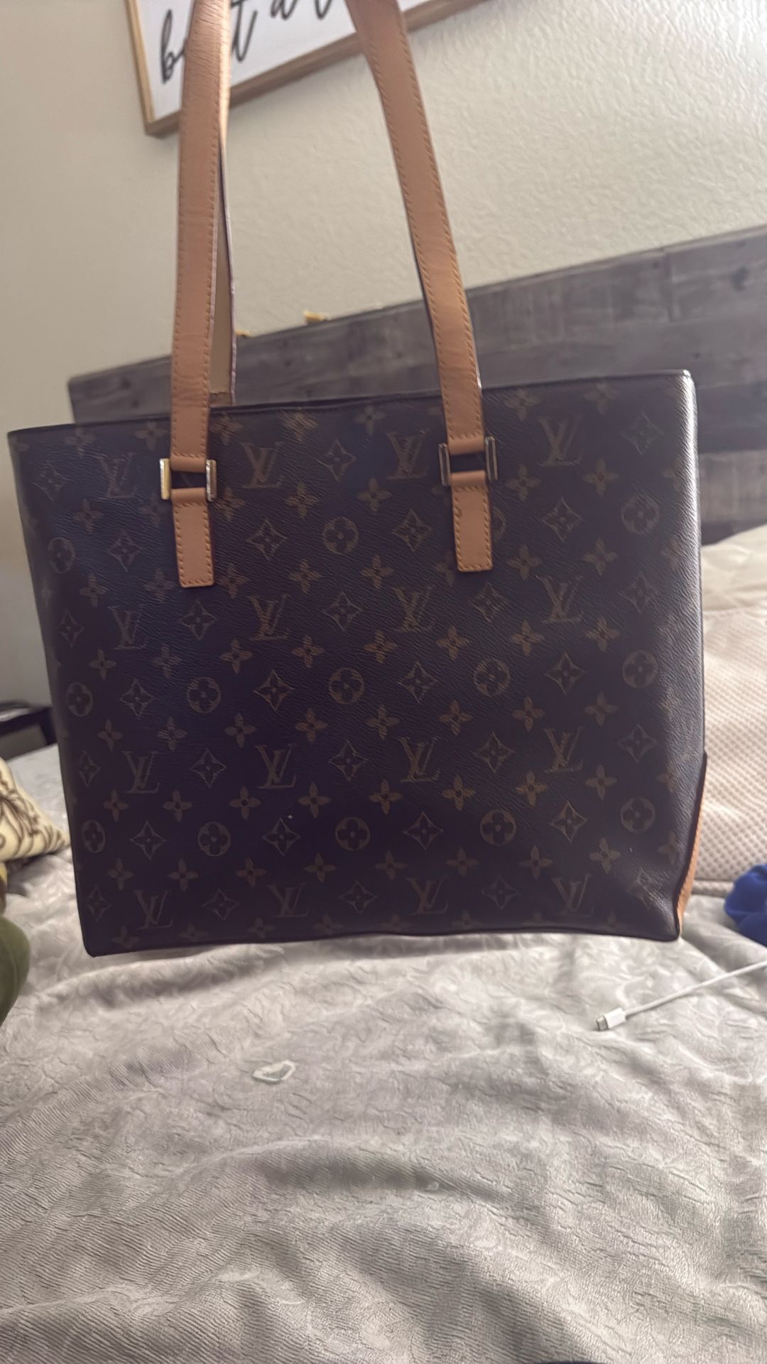 Lv Bag ! In Okay condition. Slightly used, but still works great.