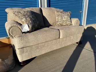 Brand New. Ashley Furniture Love Seat. Only 1 available. $399.  