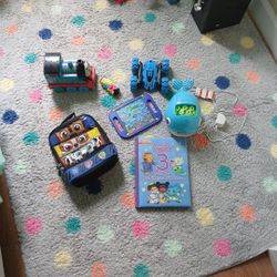 7 Parcel Kids Mostly Unused Lunch - Vackpack, Whale Bubble Maker, Daniel Tiger New Book, & Trick Terrain Car, Thomas The Train LG,PARCEL ONLY $20