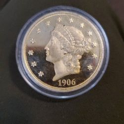 This is a replica of a Barber half dollar.