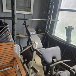Weight Lift Bench with some weights. 