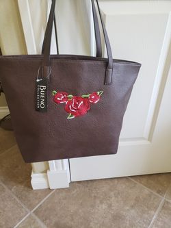 Beautiful brown tote with rose design embroidery.