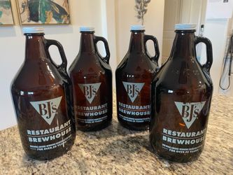 Growlers from BJ’s Restaurant 1 free with purchase - great for home brewing or vase etc