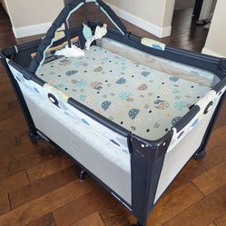 Graco Pack & Play Crib, Mattress, & Sheet