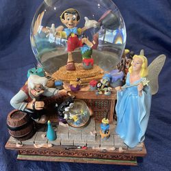 Disneys Pinocchio & Snow White Share a Dream Come True Musical big snow globe 