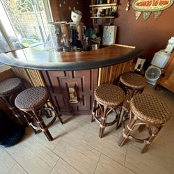 Indoor Tiki Bar With Five Stools