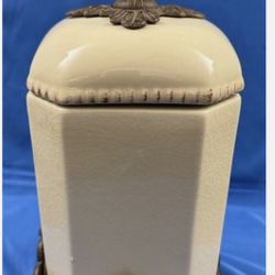 15-Inch Tall Cream Ceramic Canister with Acanthus Leaf Adorned Metal Base