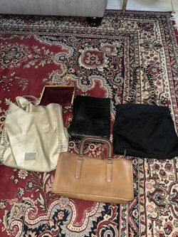 Purse Collection Includes Coach and Bebe!