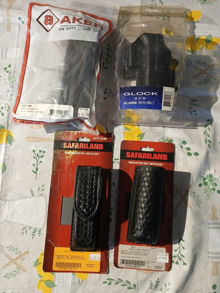 New 2 mace holders ,mag holder,glock roto belt holder..never used,still in package $10 each firm