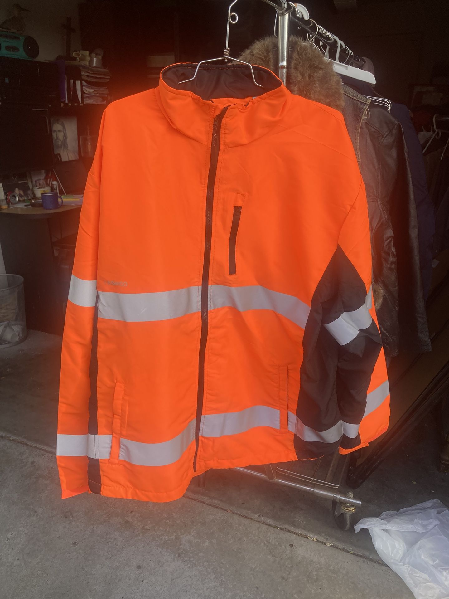 New, ML Kishigo Premium Black Series Soft Shell Jacket. Orange X Large And Medium