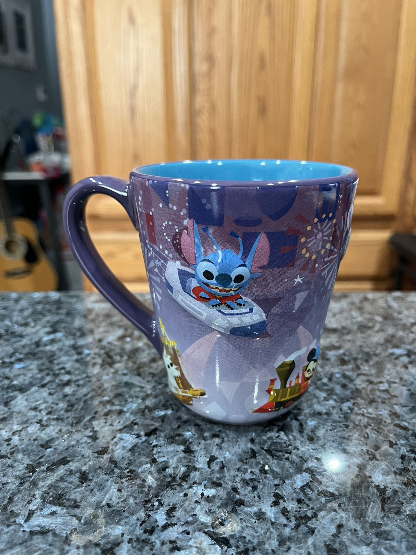 Ceramic Disney Parks Mug Cup by Joey Chou. With Stitch on one side. Capacity 11 ounces. Brand new with tags.