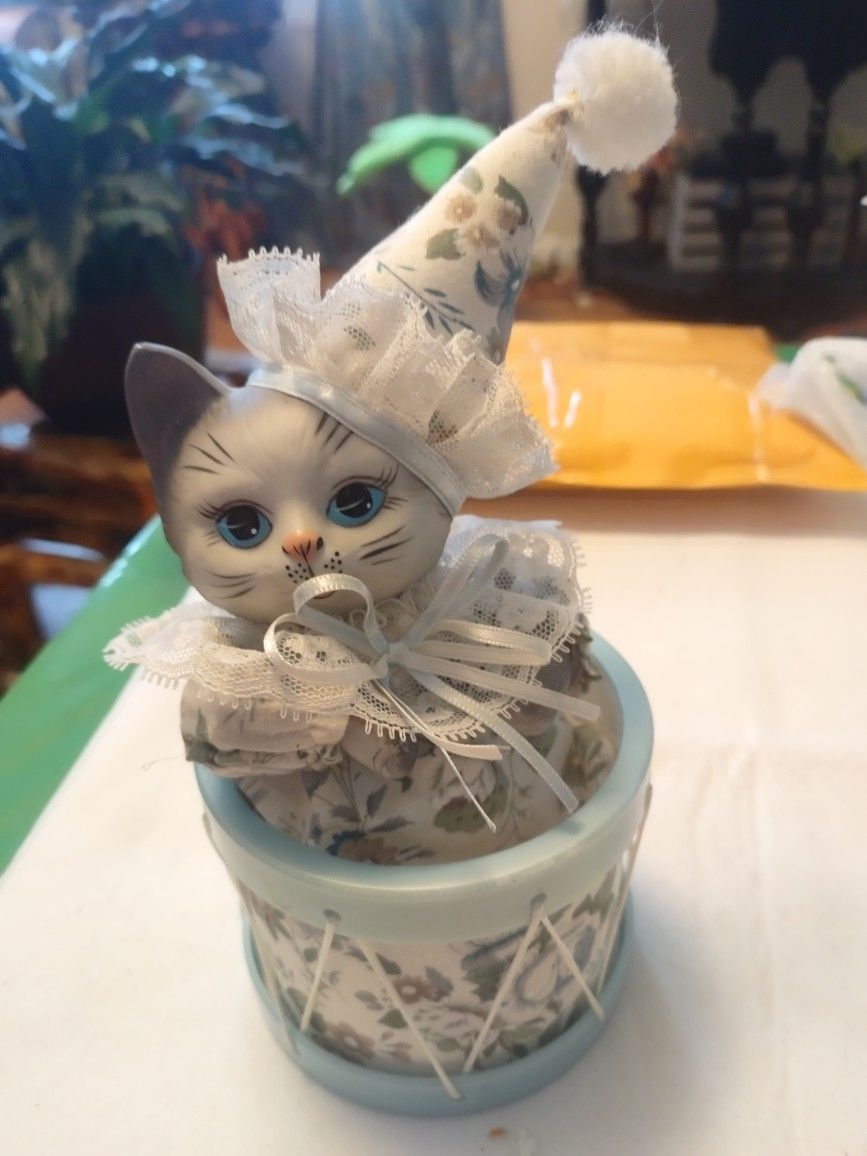 Little Gray Kitten In A Drum Plays Music