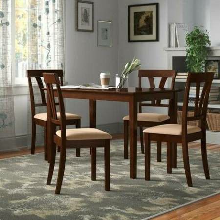 5 pc. Dining/Kitchen table set! Brand new still in the boxes! 